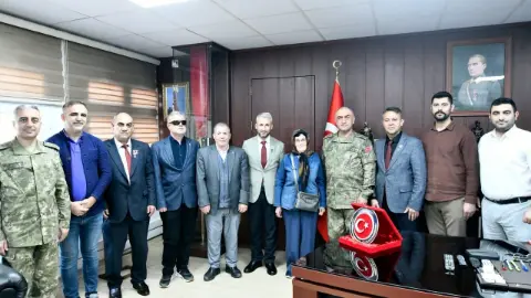 Şehit aileleri ve gazilerden Albay Altınok’a anlamlı ziyaret