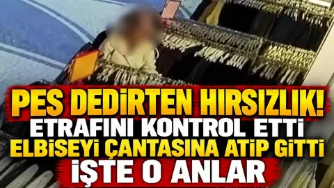 Kadın hırsız kameraya yakalandı! Elbiseyi böyle çaldı