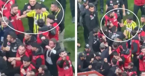 Mert Hakan Yandaş saha içinde görev yapan polisi önce itip tartıştı